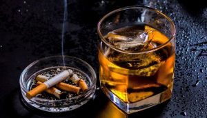 GettyImages-533286391-cigarettes-and-alcohol-smoking-drinking-oasis-1120